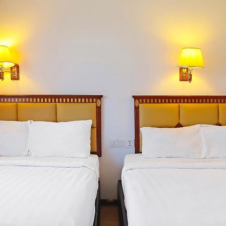 Super Oyo 90464 Borneo Suites Hotel Кота-Кінабалу Екстер'єр фото