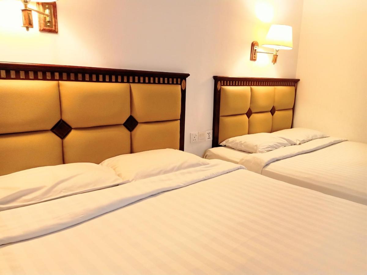 Super Oyo 90464 Borneo Suites Hotel Кота-Кінабалу Екстер'єр фото